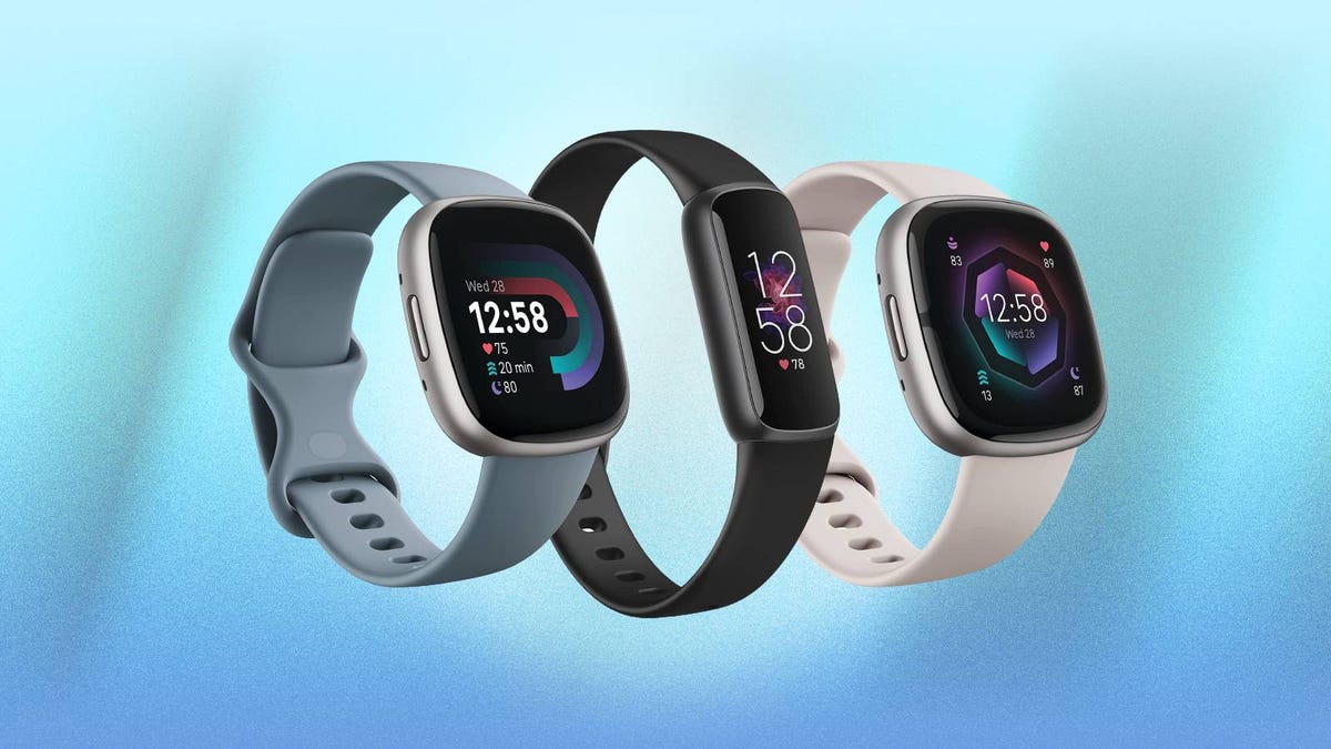 The Fitbit Versa 4, Luxe and Sense 2 are displayed against a blue background.