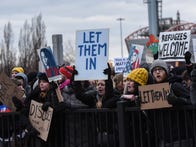 <p>Protestors rally against President Trump's immigration ban at John F. Kennedy International Airport in New York.</p>
