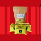 Yellow pouches of dessicant on a red background