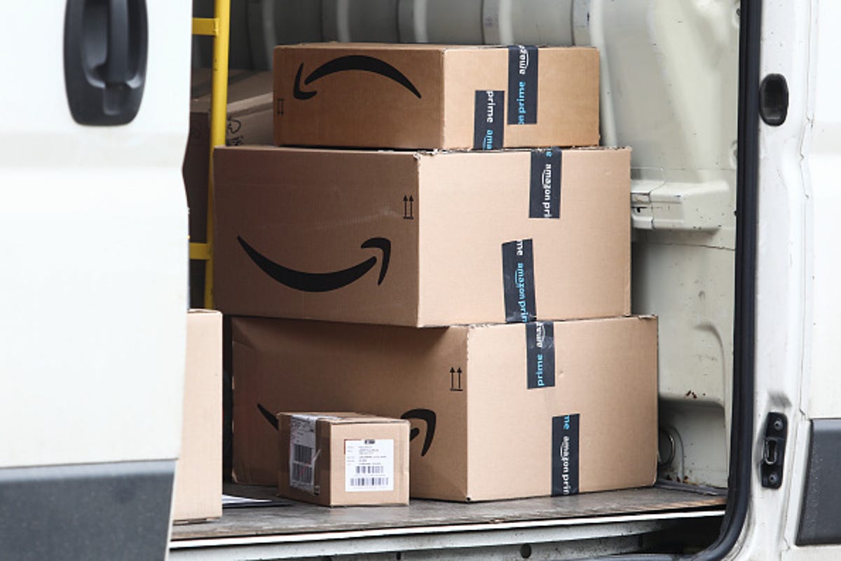 Amazon boxes inside a delivery truck