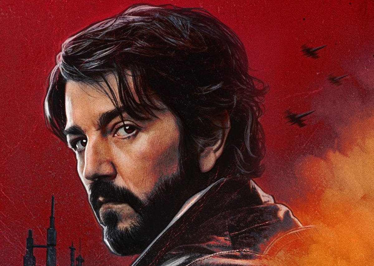 Cassian Andor gazes over his shoulder against a red background in this Andor poster