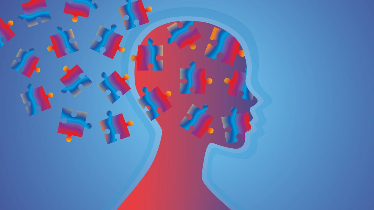 An illustration of a person with puzzle pieces on their head