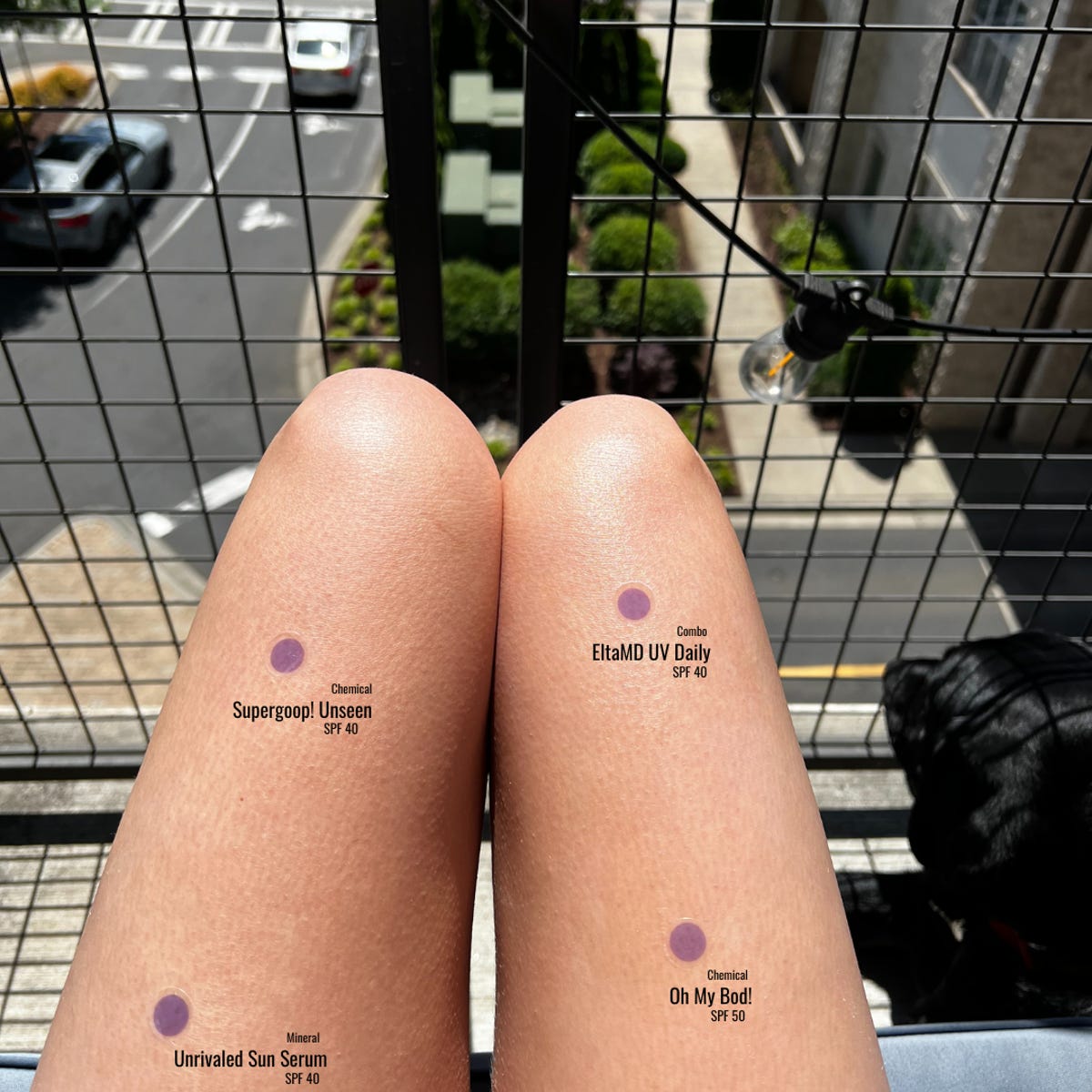 Four sun stickers on upper legs. Each is labeled with the sunscreen brand and SPF