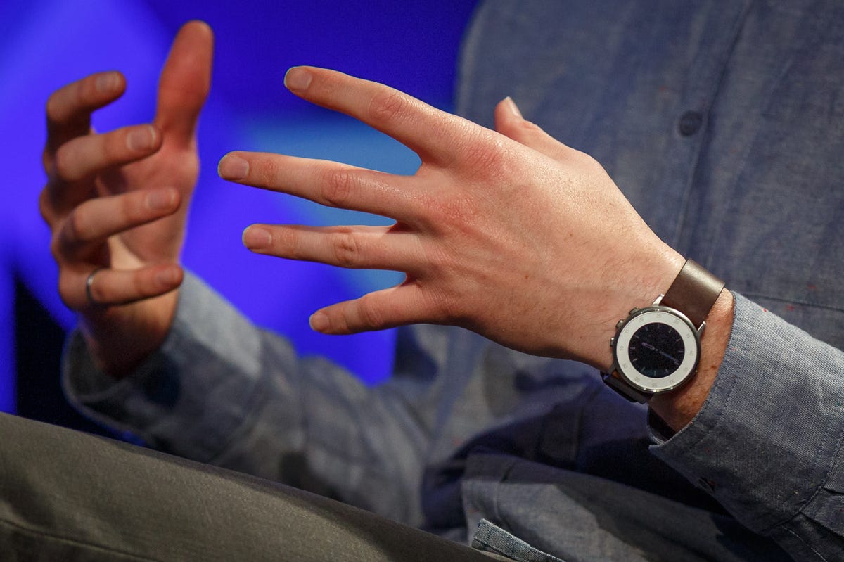 Pebble CEO Eric Migicovsky wears a Pebble Time Round watch​ at the Web Summit tech conference.