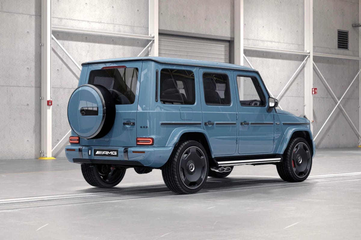 Rear 3/4 view of a blue Mercedes-AMG G63 showing new monoblock wheels