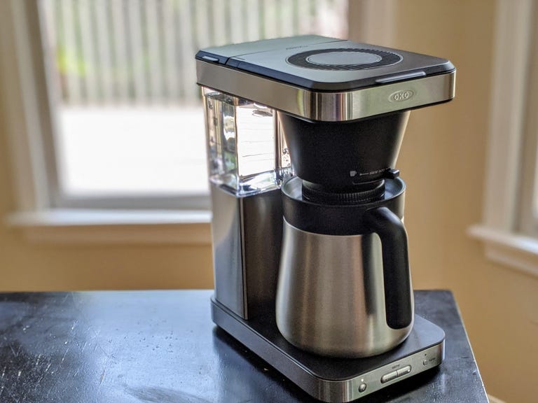 The Oxo Brew 8-Cup Coffee Maker sits on a countertop.