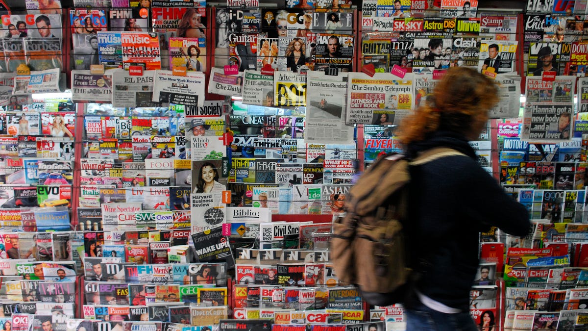 Newspapers, Magazines on display At Newsstand