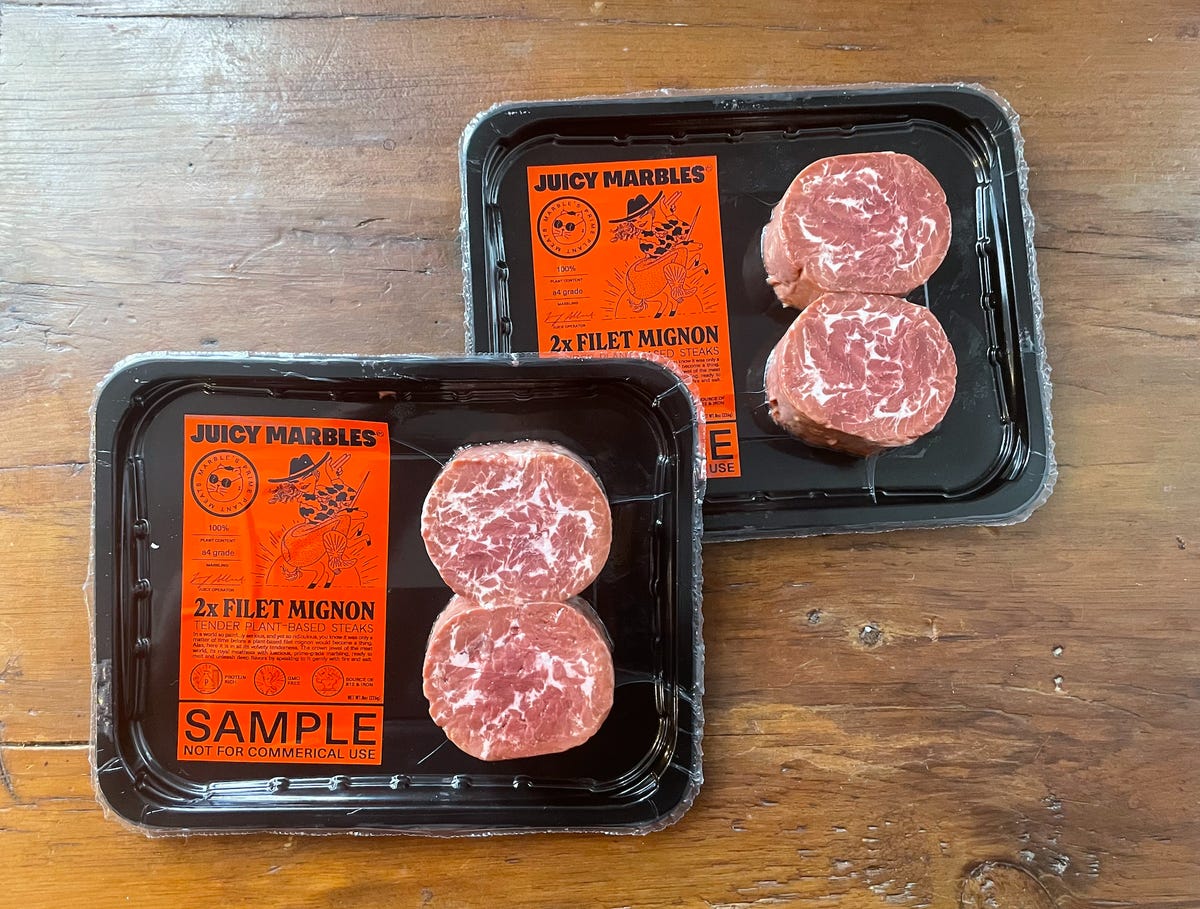Four Juicy Marbles steaks sealed in packaging