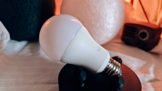 Wiz smart light bulb on a table