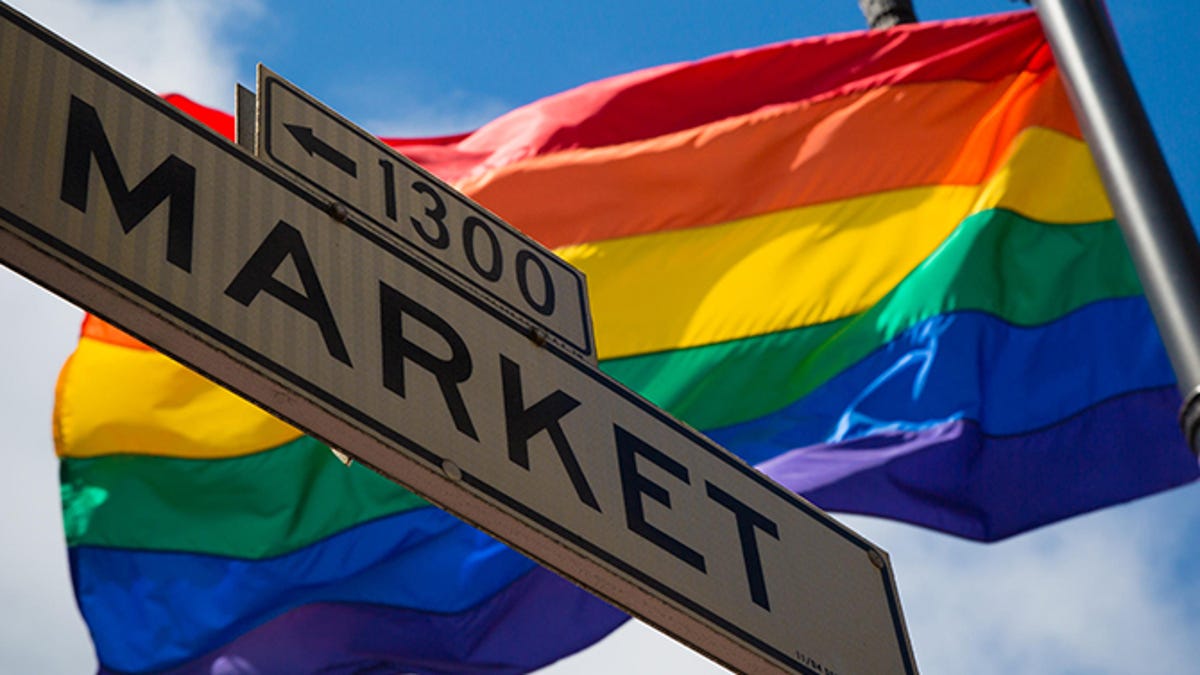 Pride flag flying over Market Street