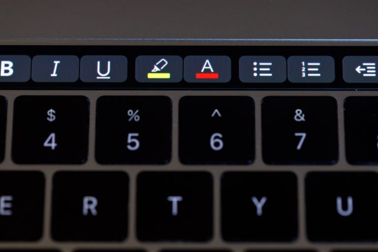 Microsoft Word offers highlight, text color, and other tools through the Touch Bar.