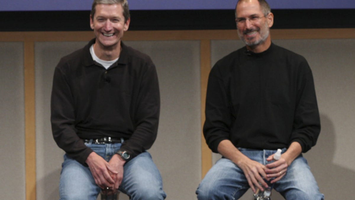 Tim Cook and Apple co-founder Steve Jobs.