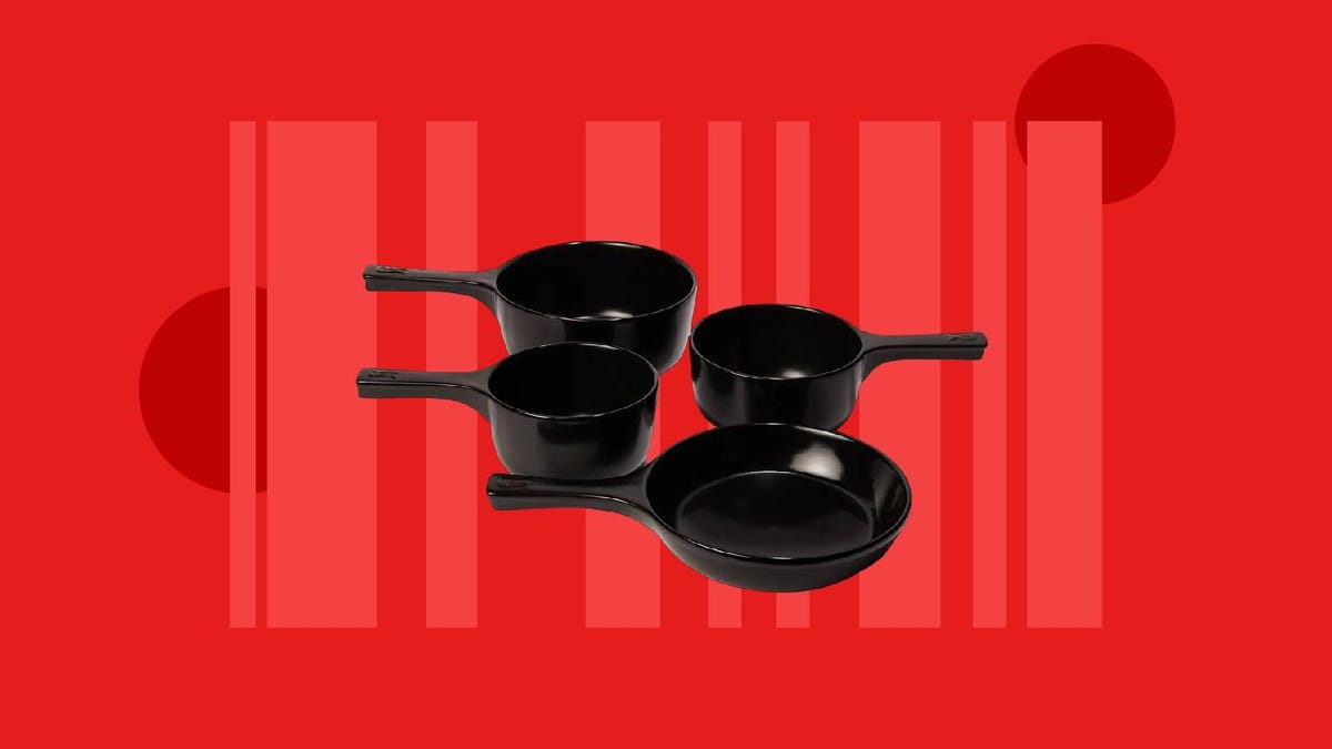 Four Xtrema ceramic pans against a red background.