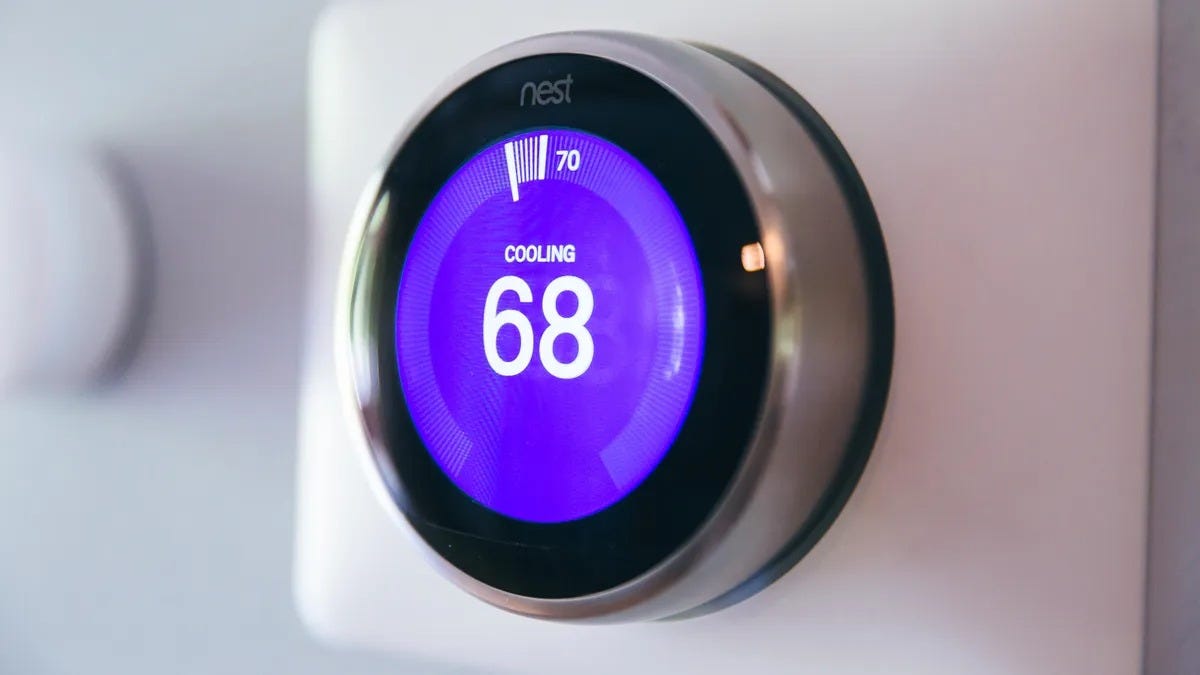 The Google Nest Learning Thermostat (3rd-gen) is displayed against a yellow background.
