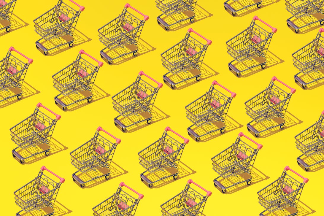 An illustration showing multiple shopping carts against a yellow background.
