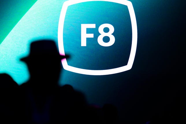 Facebook F8 logo on screen