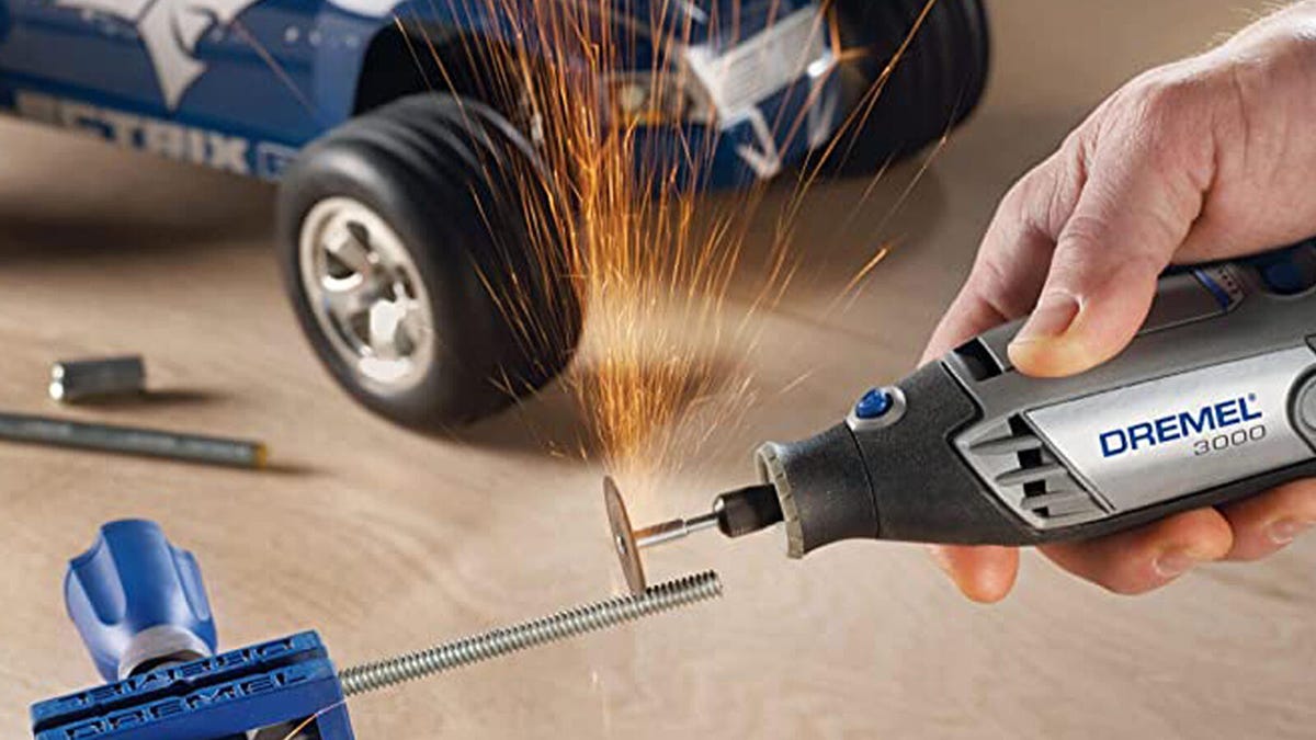 Sparks fly as the Dremel 3000 from Bosch is used for metal grinding.