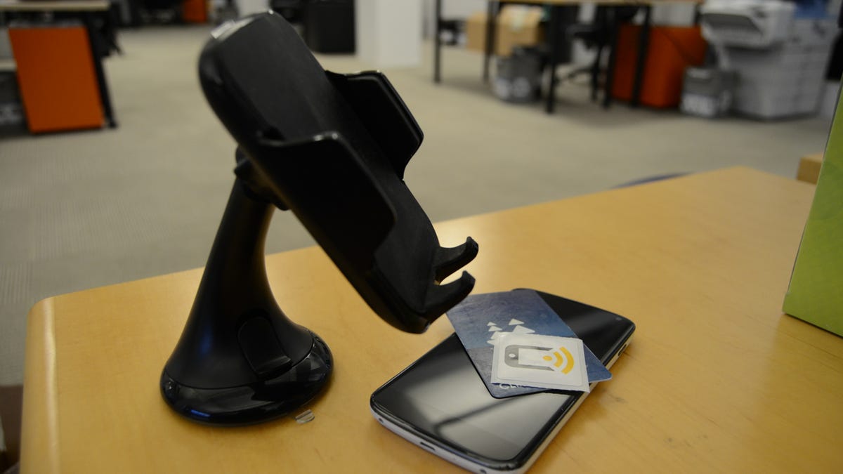Car cradle, phone, NFC stickers, and transit card