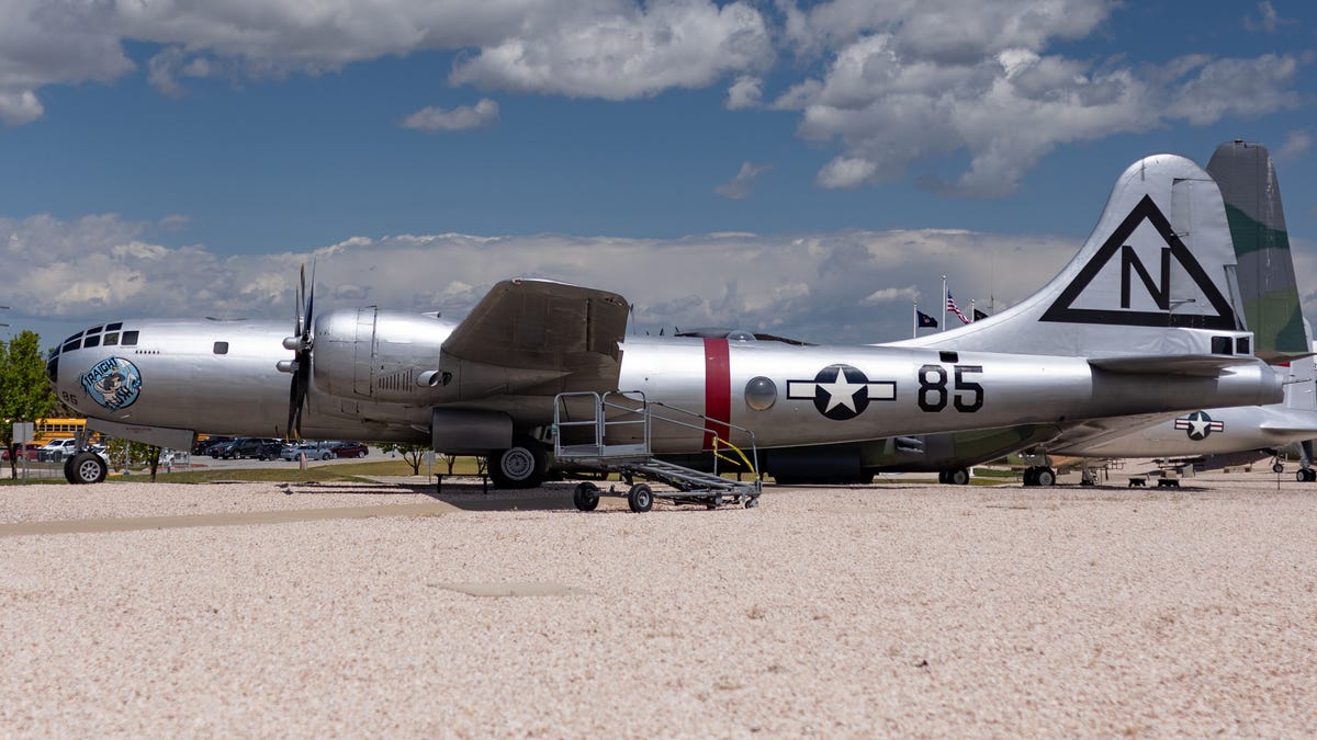 A side view of a restored B-29 bomber.