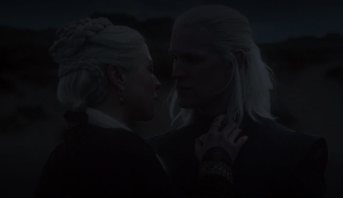 Daemon and Rhaenyra are hard to see in this dark image of them on the beach from episode 7