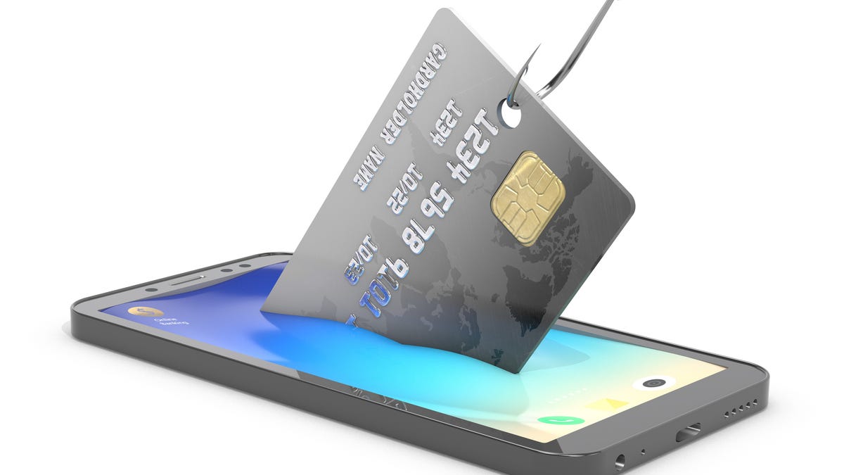 An image of a credit card being pulled out of a smartphone by a fishhook.