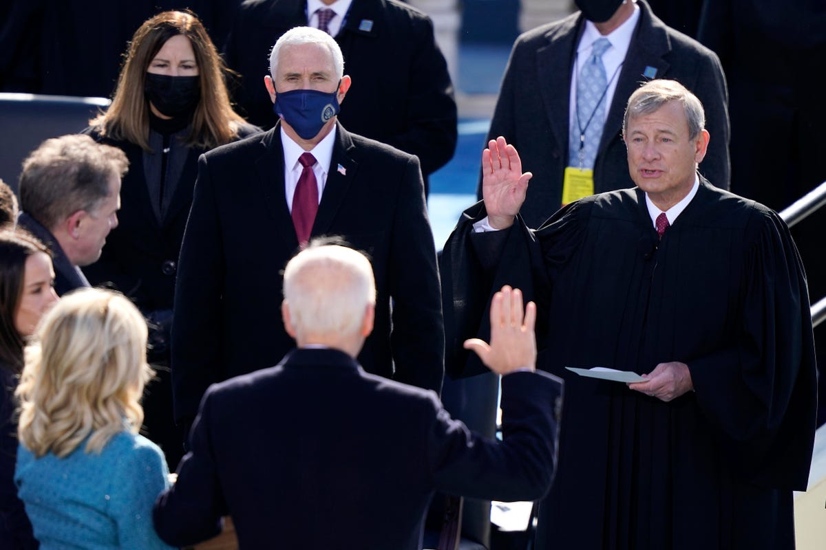 Joe Biden is sworn in as U.S. President by U.S. Supreme Court Chief Justice John G. Roberts