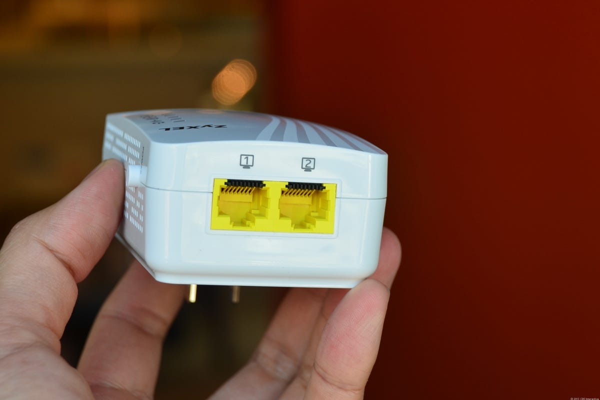 The ZyXel PLA4231 has two network ports to host two wired devices at the far end of a power-line connection.