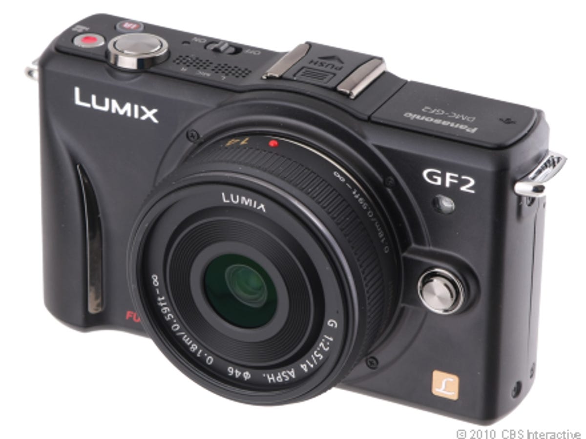 Panasonic_Lumix_DMC-GF2_(black,_with_14mm_lens)_-_Panasonic_Lumix_DMC-GF2_(black,_with_14mm_lens).png