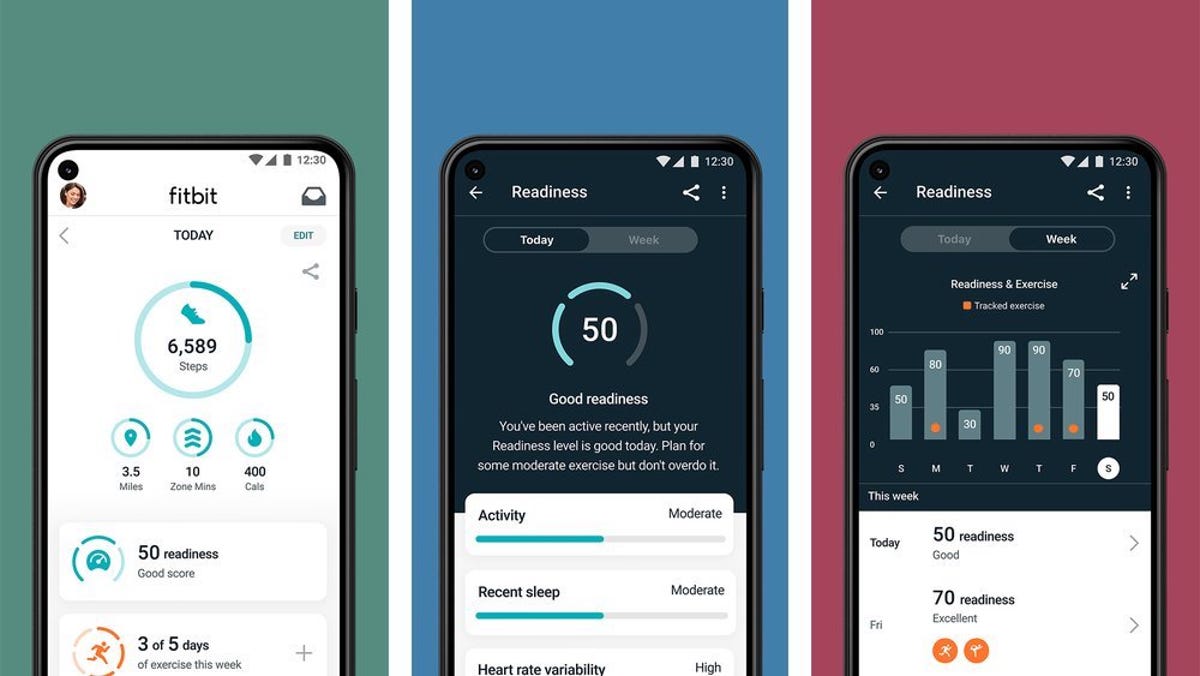 Three phones showing Fitbit stats