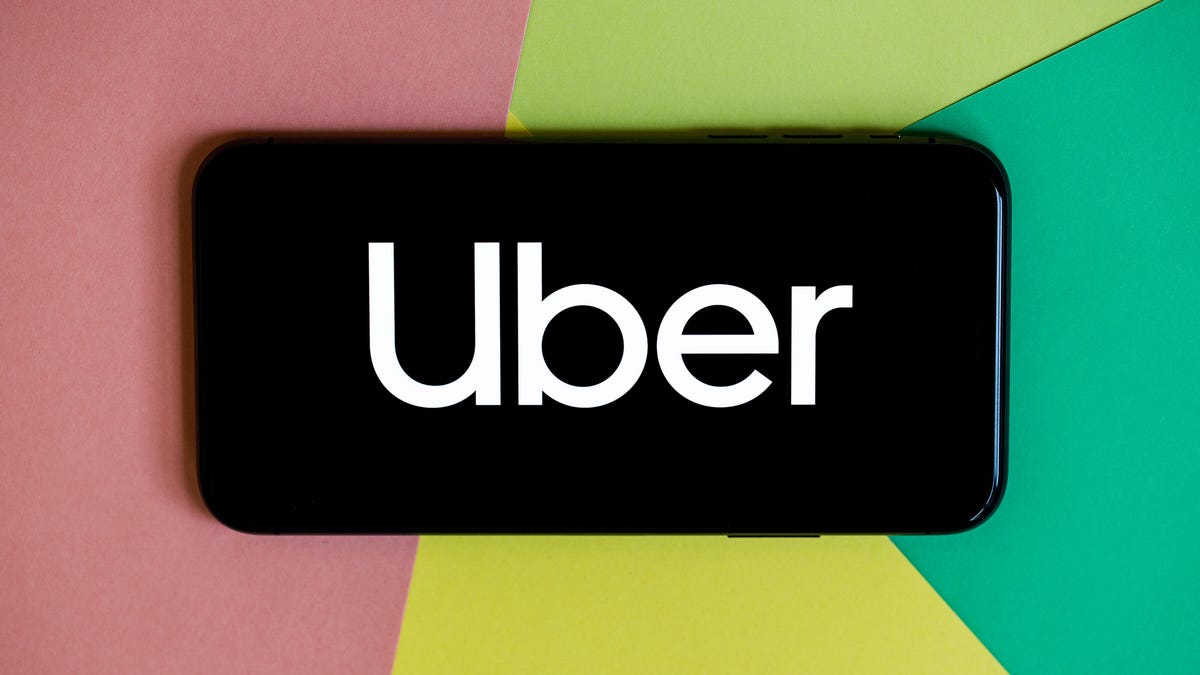 Uber logo on a phone screen