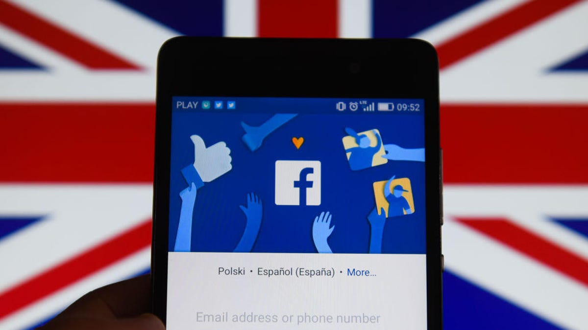 Facebook app with United Kingdom flag are seen in this photo