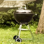 Weber Original Kettle Charcoal Grill in the backyard