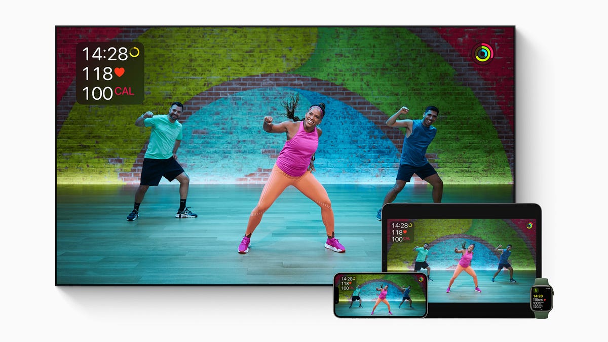 Fitness instructors lead a dance workout on Apple Fitness Plus.