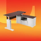 A white L-shaped desk on an orange and red background