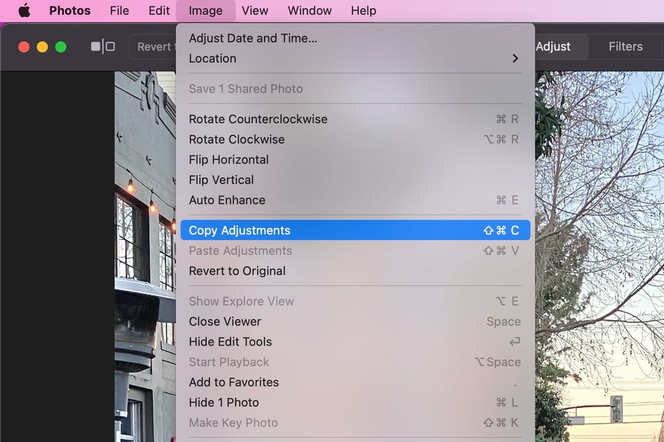 The mac dropdown menu with 'Copy adjustments' selected