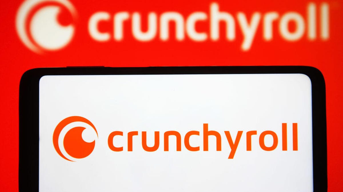A smartphone with the Crunchyroll logo on it