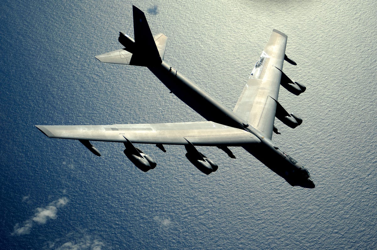 A B-52 Stratofortress flies over the Pacific Ocean after an air refueling in support of exercise Rim of the Pacific, July 10, 2010.