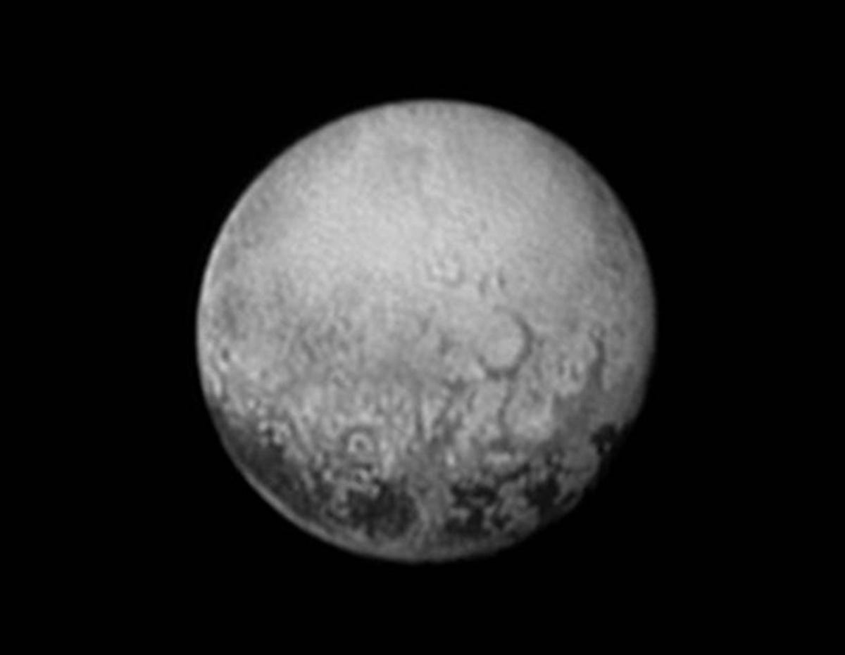 Pluto's dark spots