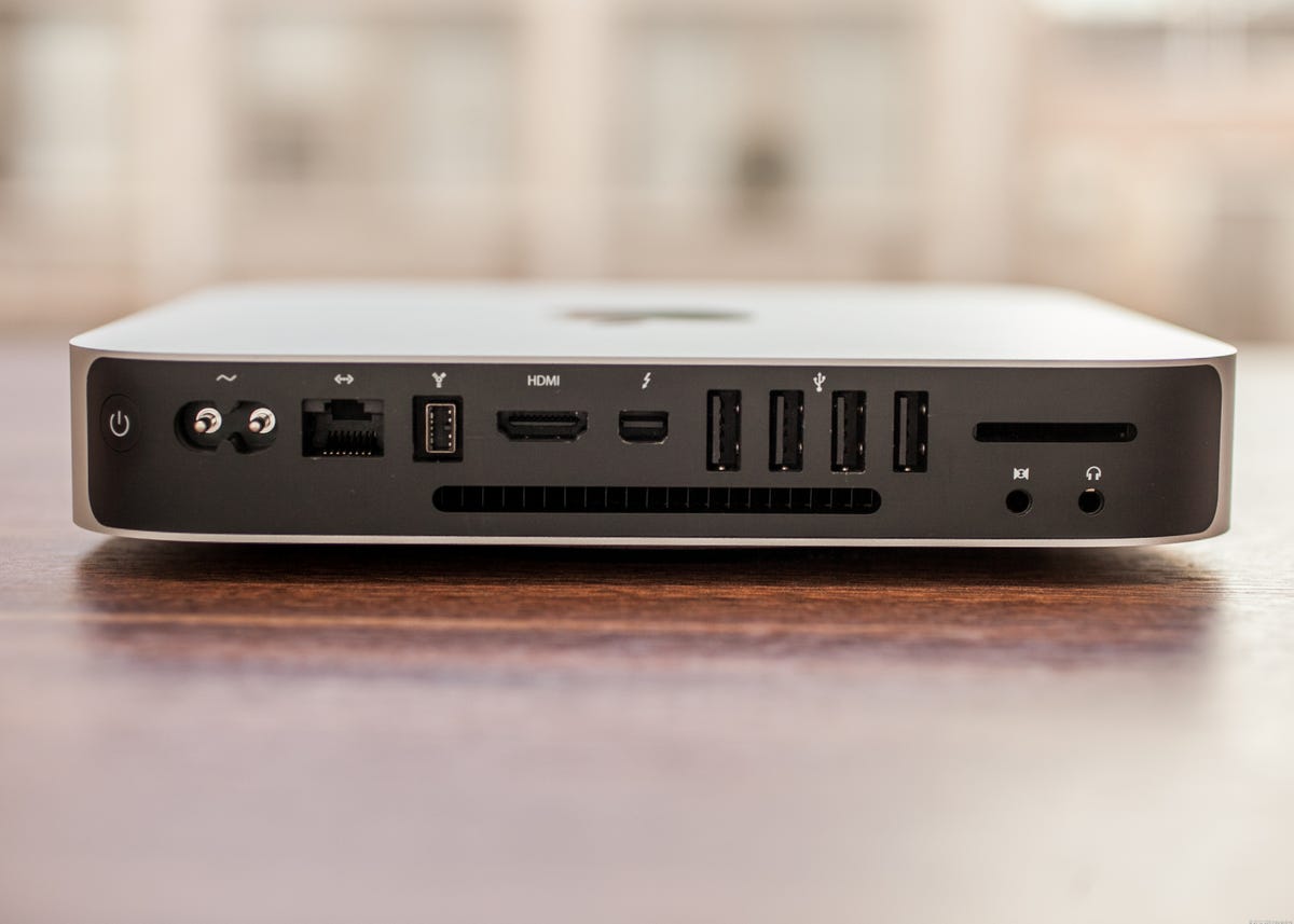 It looks the same as the old model, but the new Mac Mini has USB 3.0 ports.