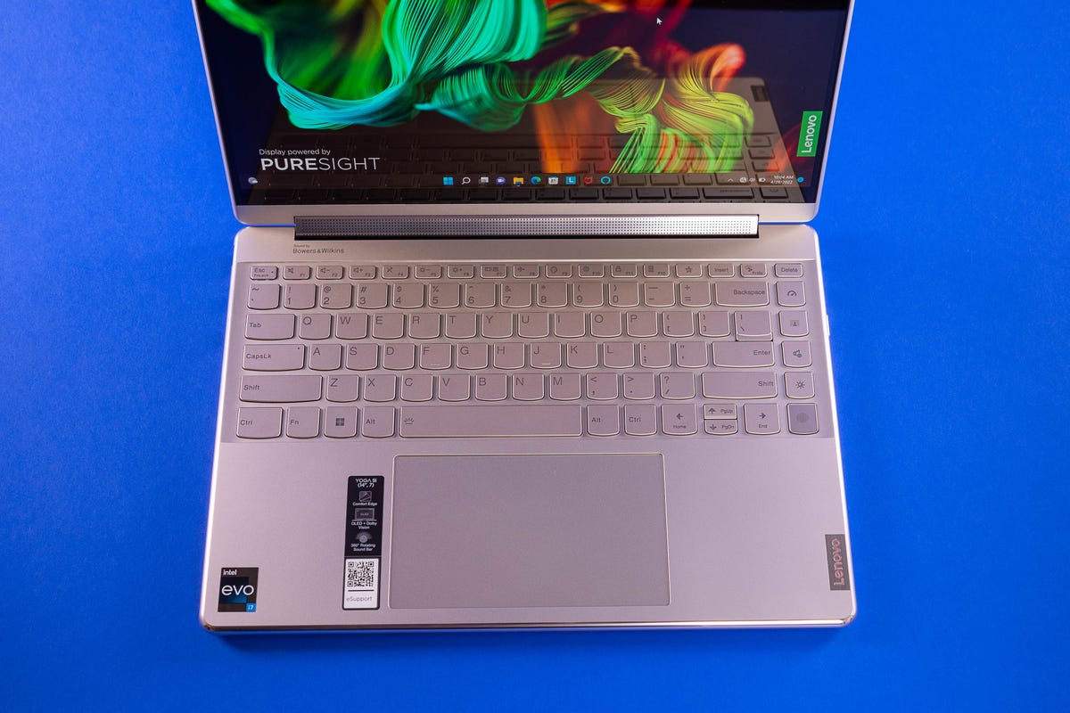 Close-up of Yoga 9i keyboard and touchpad, which features a QWERTY set and no numpad