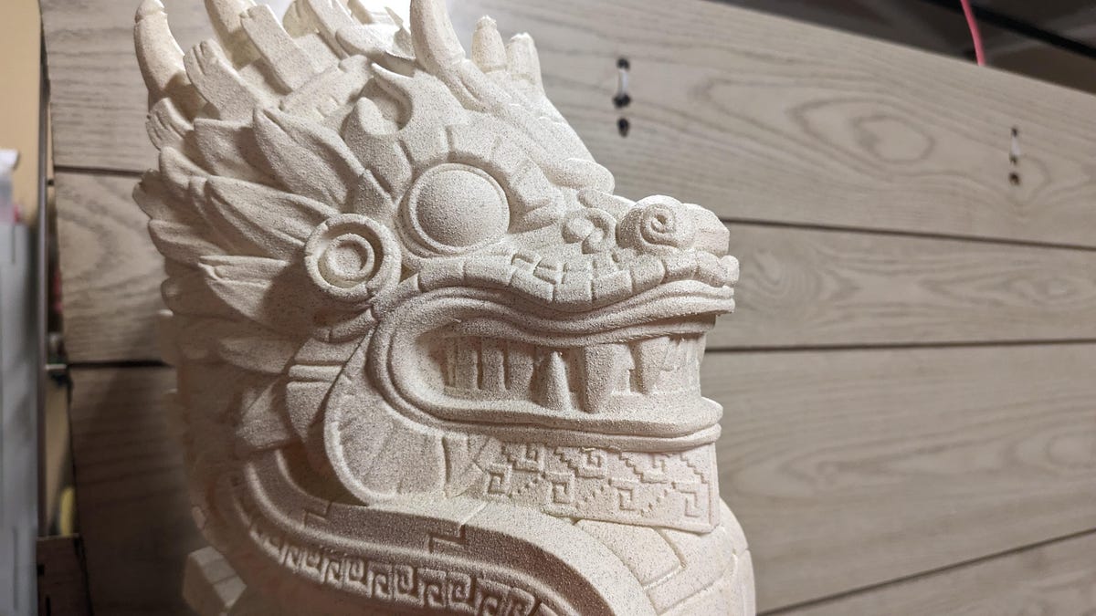 An aztec dragon on a workbench