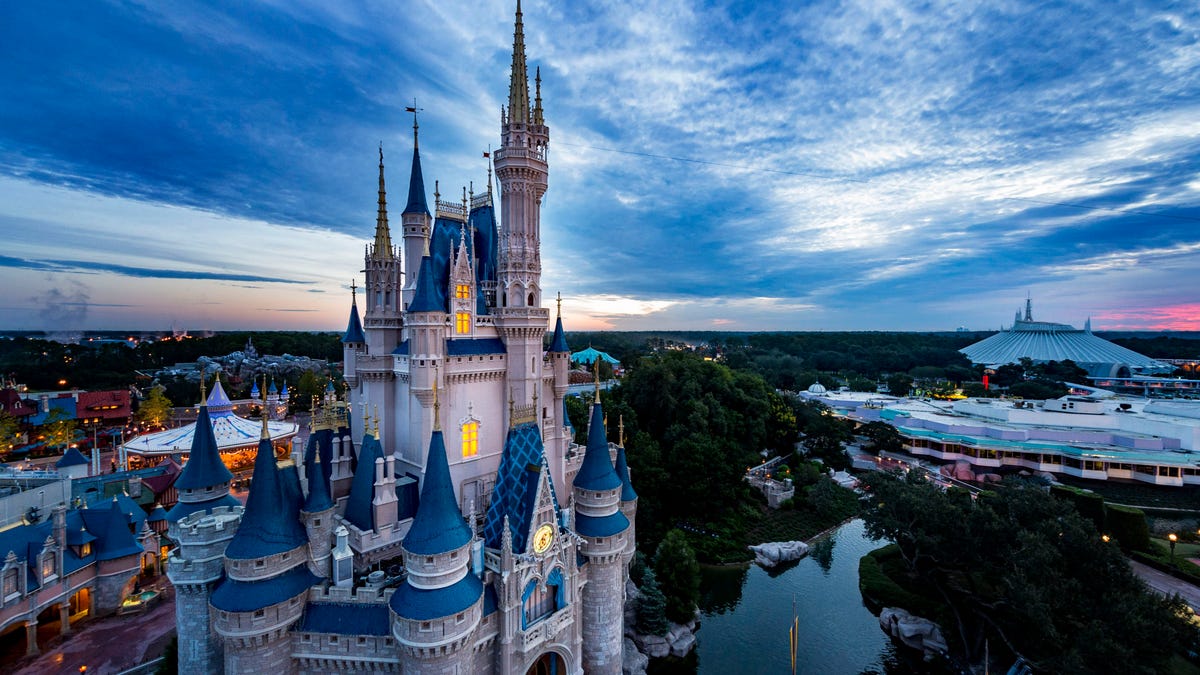 Sunset over the Magic Kingdom Park of Disney World in Florida