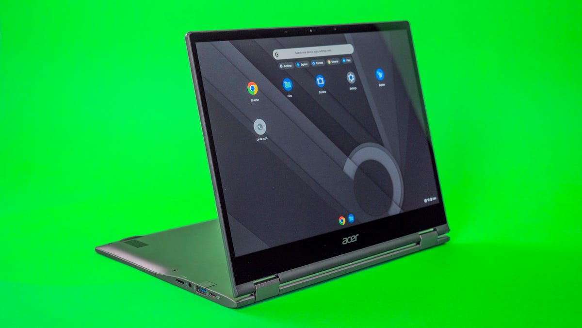 Acer Chromebook Spin 513 on a green background