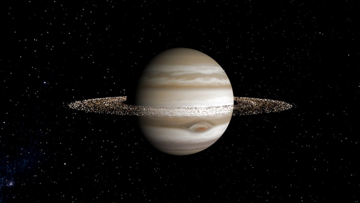 A depiction of Jupiter with rocky rings surrounding it.