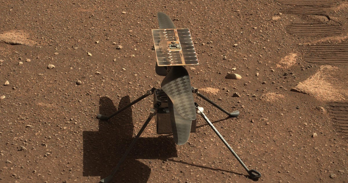 NASA Mars Helicopter Takes Flight With Weird Debris Stuck to Its Leg