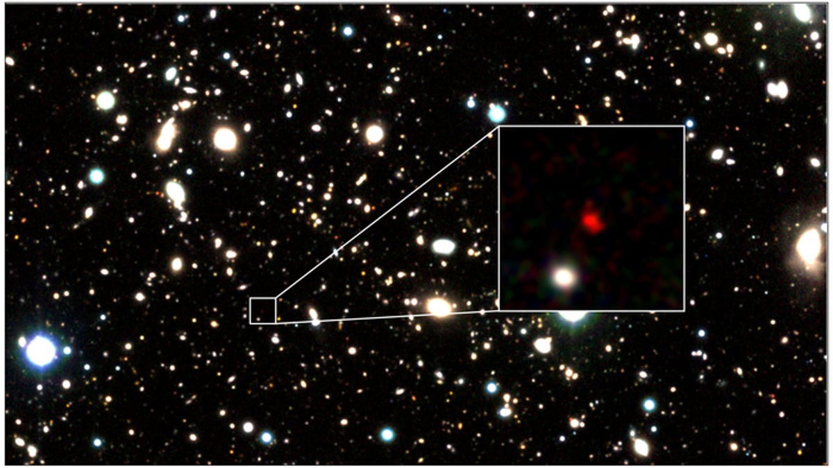 A red pixel, HD1, is featured inset of a crowded galaxy