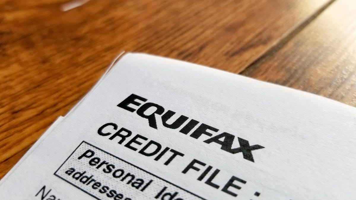 Close-up of the upper corner of a consumer credit report from the credit bureau Equifax, with text reading Credit File and Personal Identification. Equifax executives in charge of information and security have resigned, the company announced Friday, one week after it announced a massive theft of consumer information from its systems.
