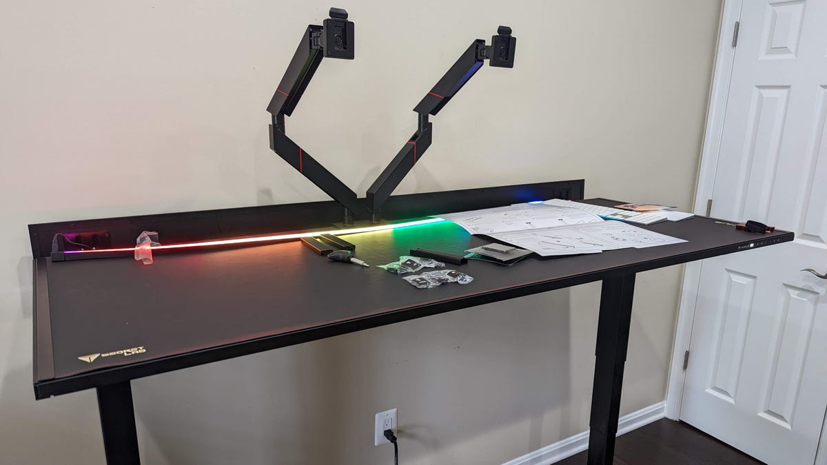 Giant black standing desk with rainbow lights