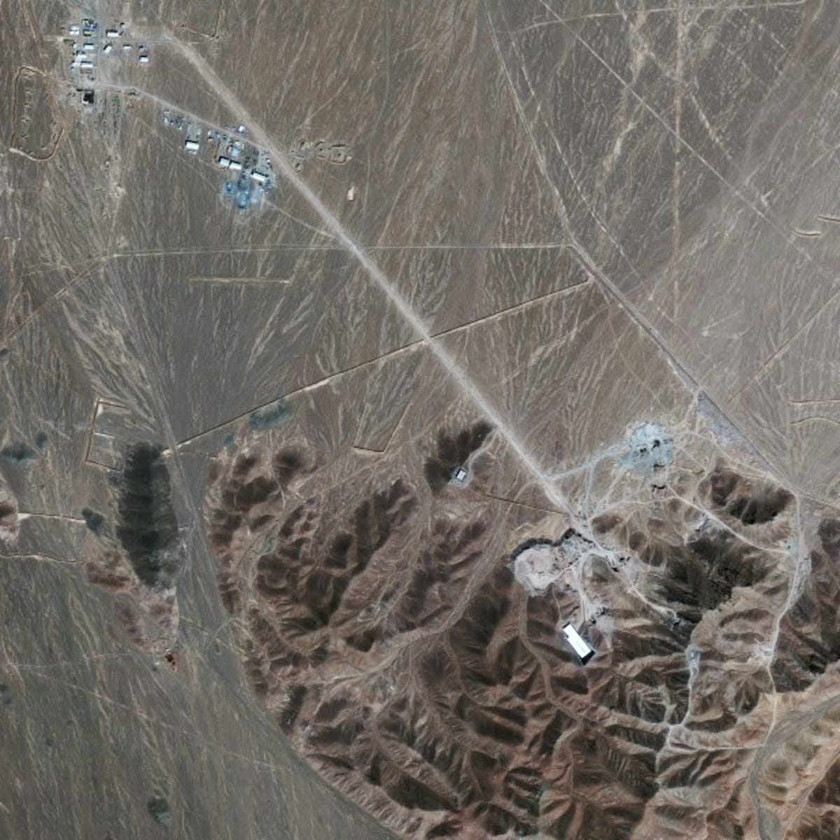 The overall view of the Iranian site. The mountain under which the site is built is to the lower right of the image.