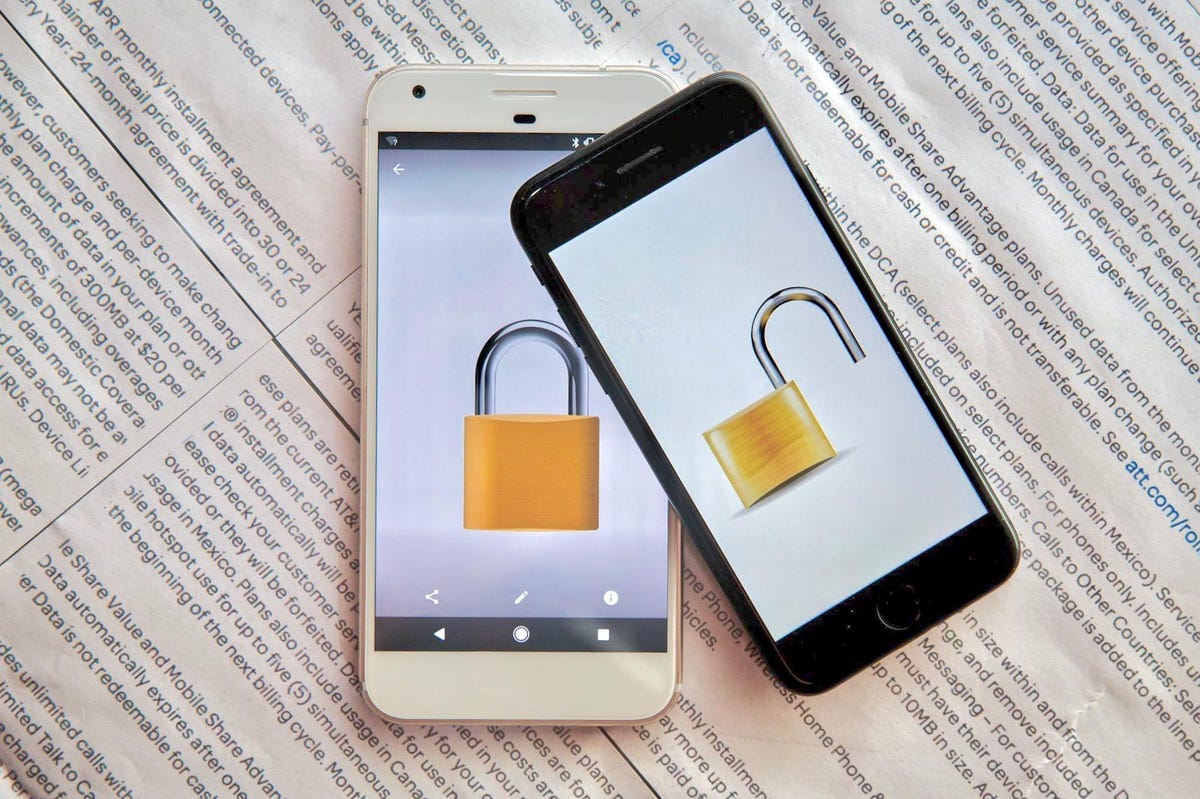 A pair of phones with images of padlocks on their screens